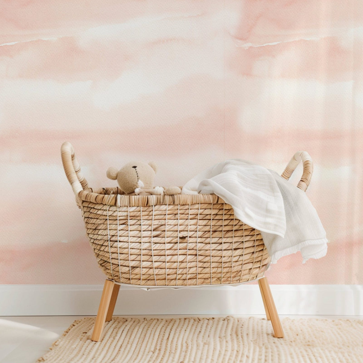 Pink Sky nursery wallpaper styled in a girls' bedroom