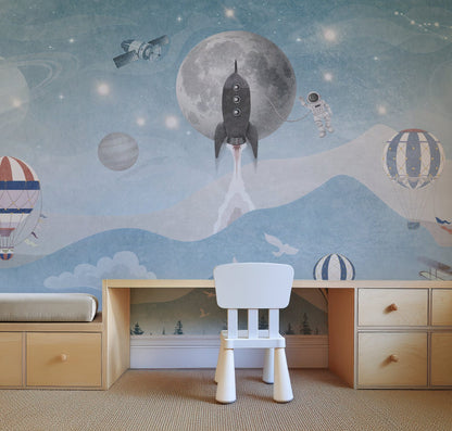 Space adventure kids wall mural in a child's bedroom with planets and cosmic decor.