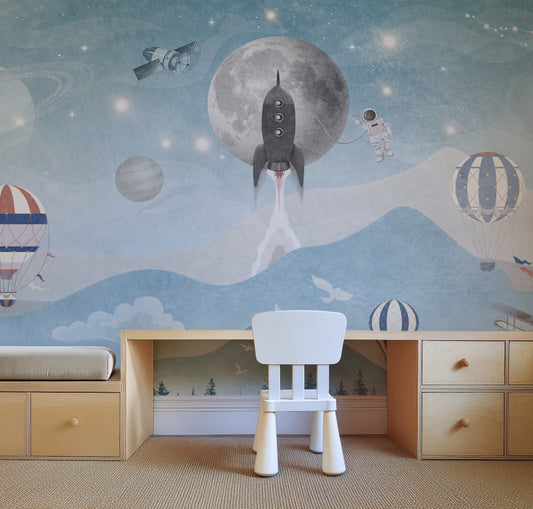 Space adventure kids wall mural in a child’s bedroom with planets and cosmic decor.