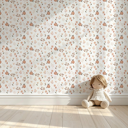 Blush Meadow warm floral wallpaper in a soft nursery