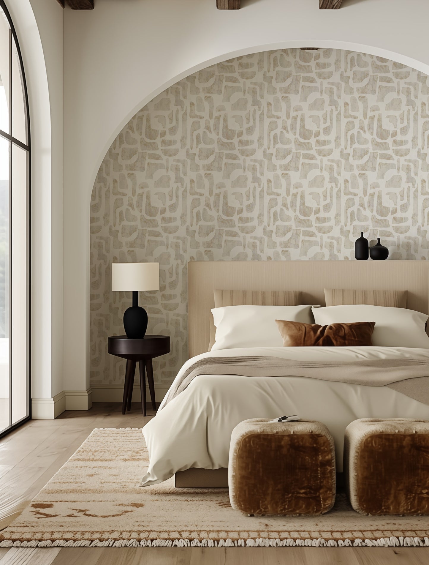 Bright Stones abstract stone-shape wallpaper in warm ivory and sand in a calm neutral bedroom