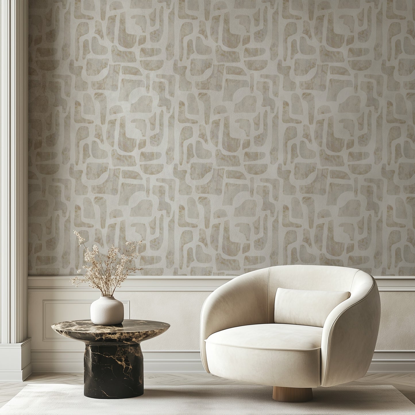 Bright Stones abstract stone-shape wallpaper in warm ivory and sand in a sunlit living room