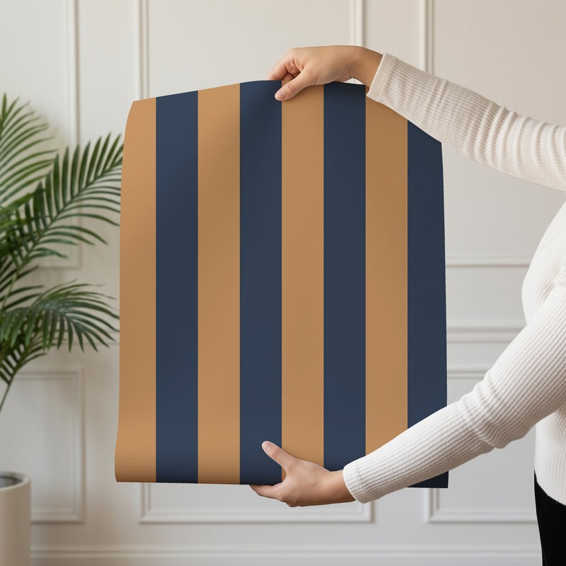 Classic Stripe Wallpaper roll in Caramel & Midnight Blue – bold stripes on a midnight blue ground