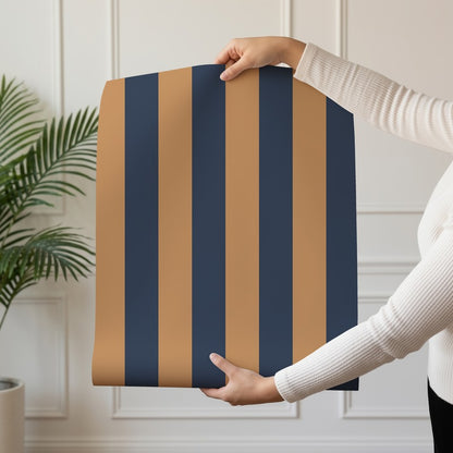 Classic Stripe Wallpaper roll in Caramel & Midnight Blue – bold stripes on a midnight blue ground