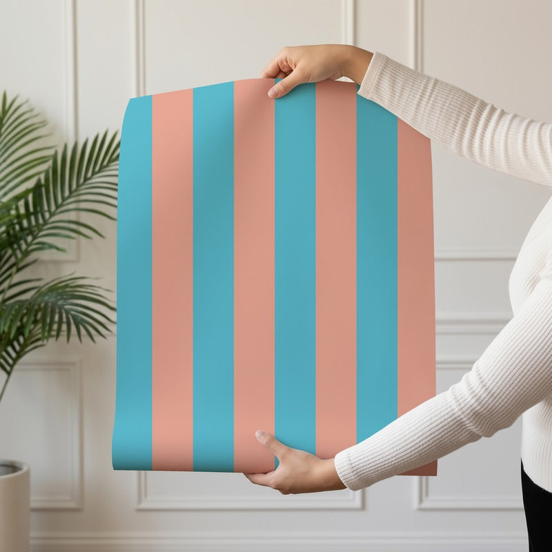Classic Stripe Wallpaper roll in Sky & Coral – bold stripes on a coral ground