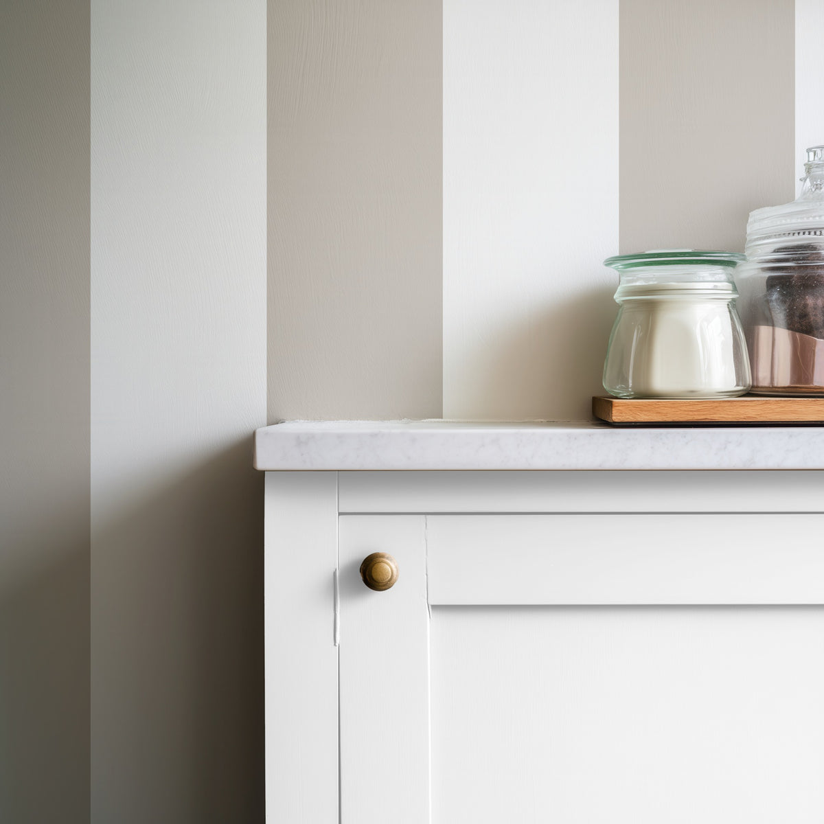 Extra-Wide Stripe Wallpaper – Cloud & Greige styled in a warm kitchen and dining space