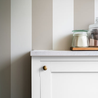 Extra-Wide Stripe Wallpaper – Cloud & Greige styled in a warm kitchen and dining space