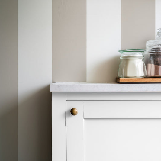 Extra-Wide Stripe Wallpaper – Cloud & Greige styled in a warm kitchen and dining space