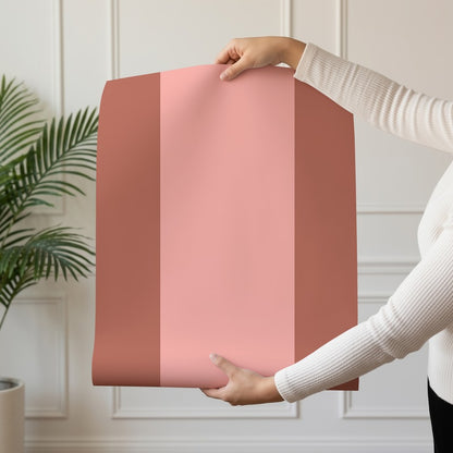 Extra-Wide Stripe Wallpaper roll in Terracotta & Peach – warm terracotta stripe on a soft peach ground