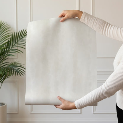 Cloud Dancer wallpaper roll drop showing the soft ivory tonal texture repeat