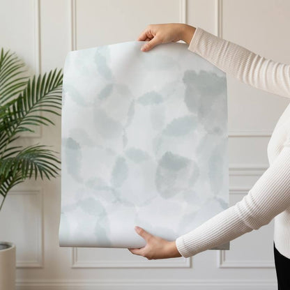 Cloudy Watercolor wallpaper design — soft pale grey-blue mottled watercolour texture