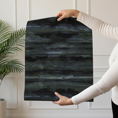 Dark Clouds moody atmospheric cloud wallpaper in deep tones shown on a single wallpaper drop
