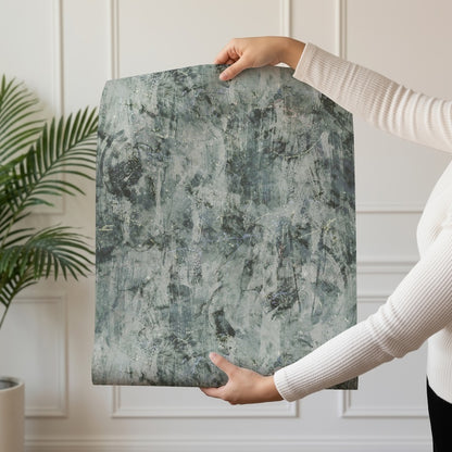 Dark Gray Texture weathered concrete-effect wallpaper in deep slate grey shown on a single wallpaper drop