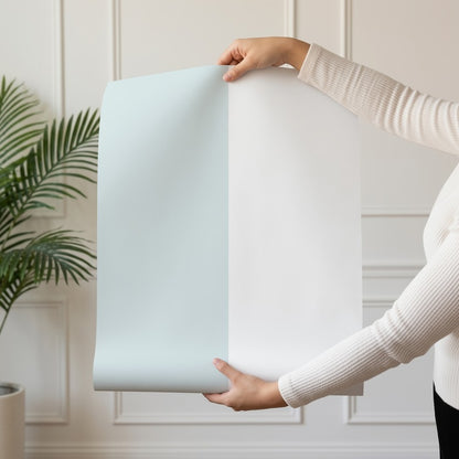 Extra-Wide Stripe Wallpaper roll in Cloud & Powder Blue – statement, extra-wide stripes on a powder blue ground