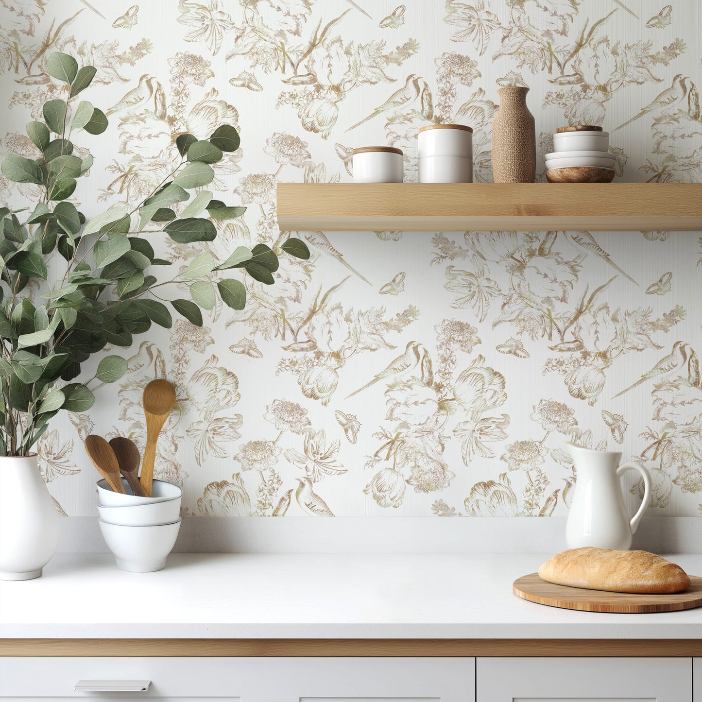 Golden Aviary gold toile wallpaper in a bright kitchen with white cabinetry