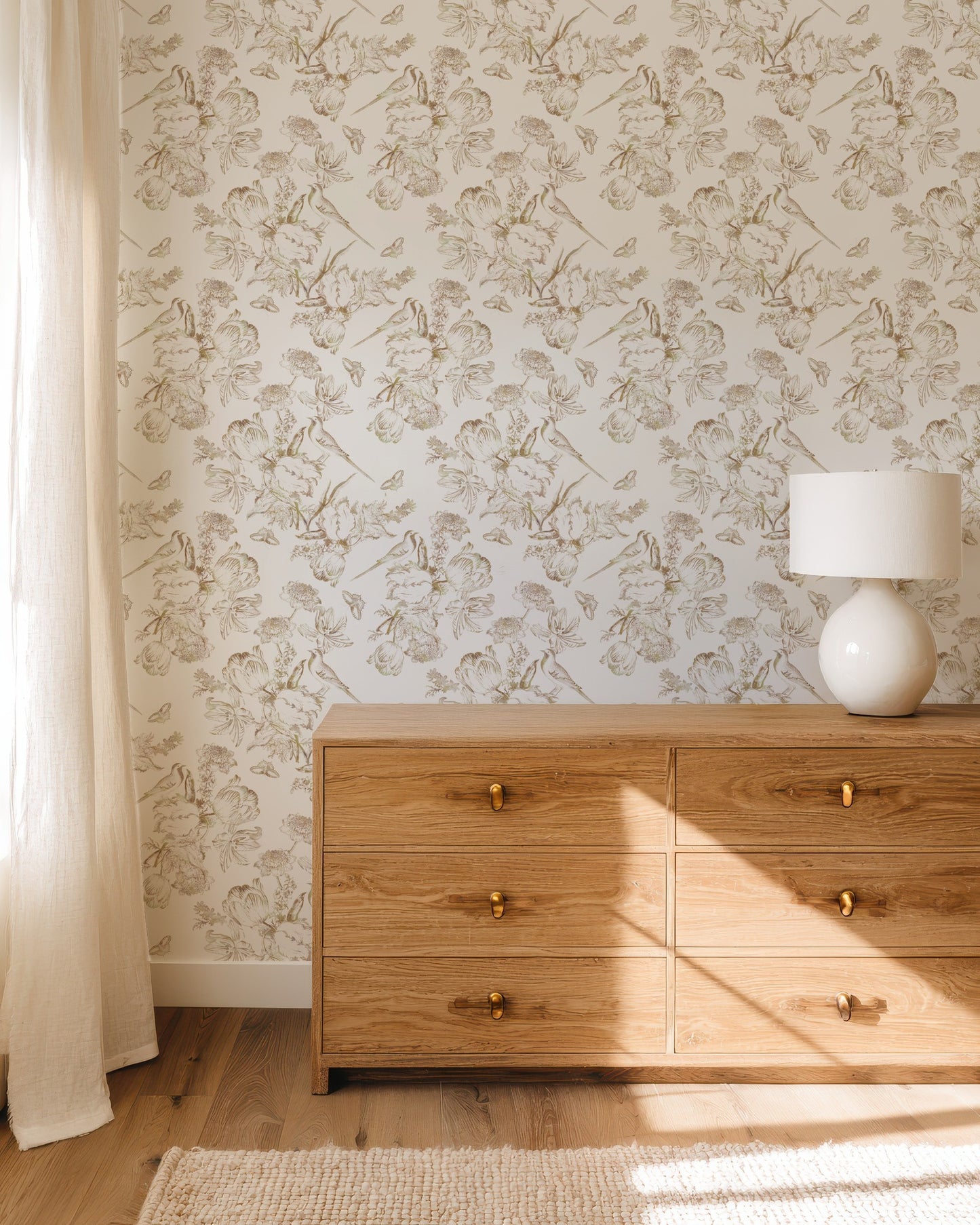 Golden Aviary antique-gold bird and floral wallpaper in an elegant bedroom