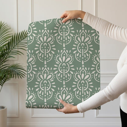 Green Rhapsody exotic botanical tropical wallpaper in deep green shown on a single wallpaper drop
