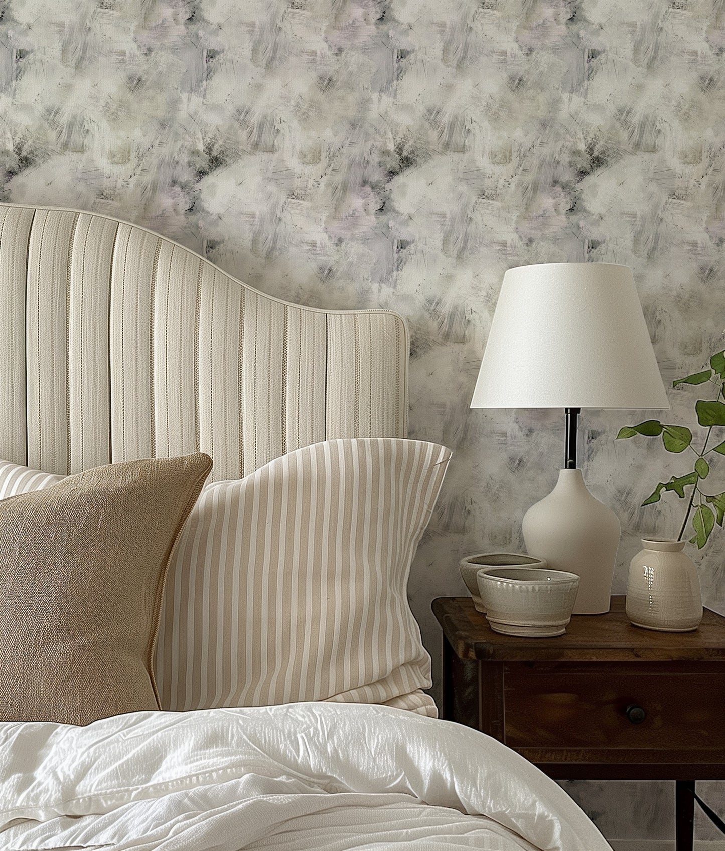 Hand Painted Pattern brushed abstract wallpaper in soft grey and ivory in a calm neutral bedroom