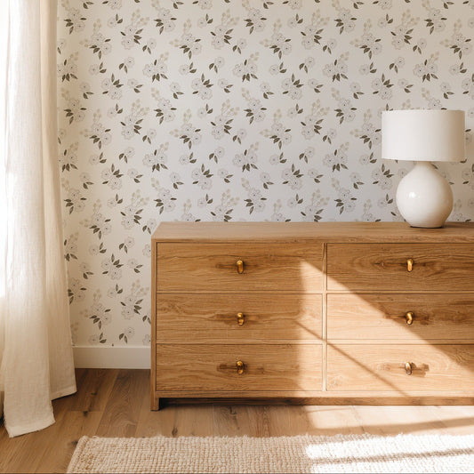 Ivory Bloom neutral floral wallpaper in a calm bedroom