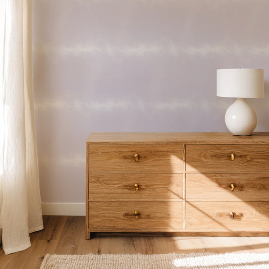 Lilac Ombre soft wallpaper in a calm, restful bedroom