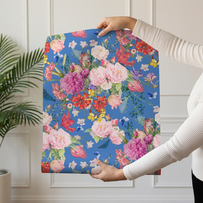 Mazzolino wallpaper roll drop showing the bold floral bouquet repeat on cobalt blue