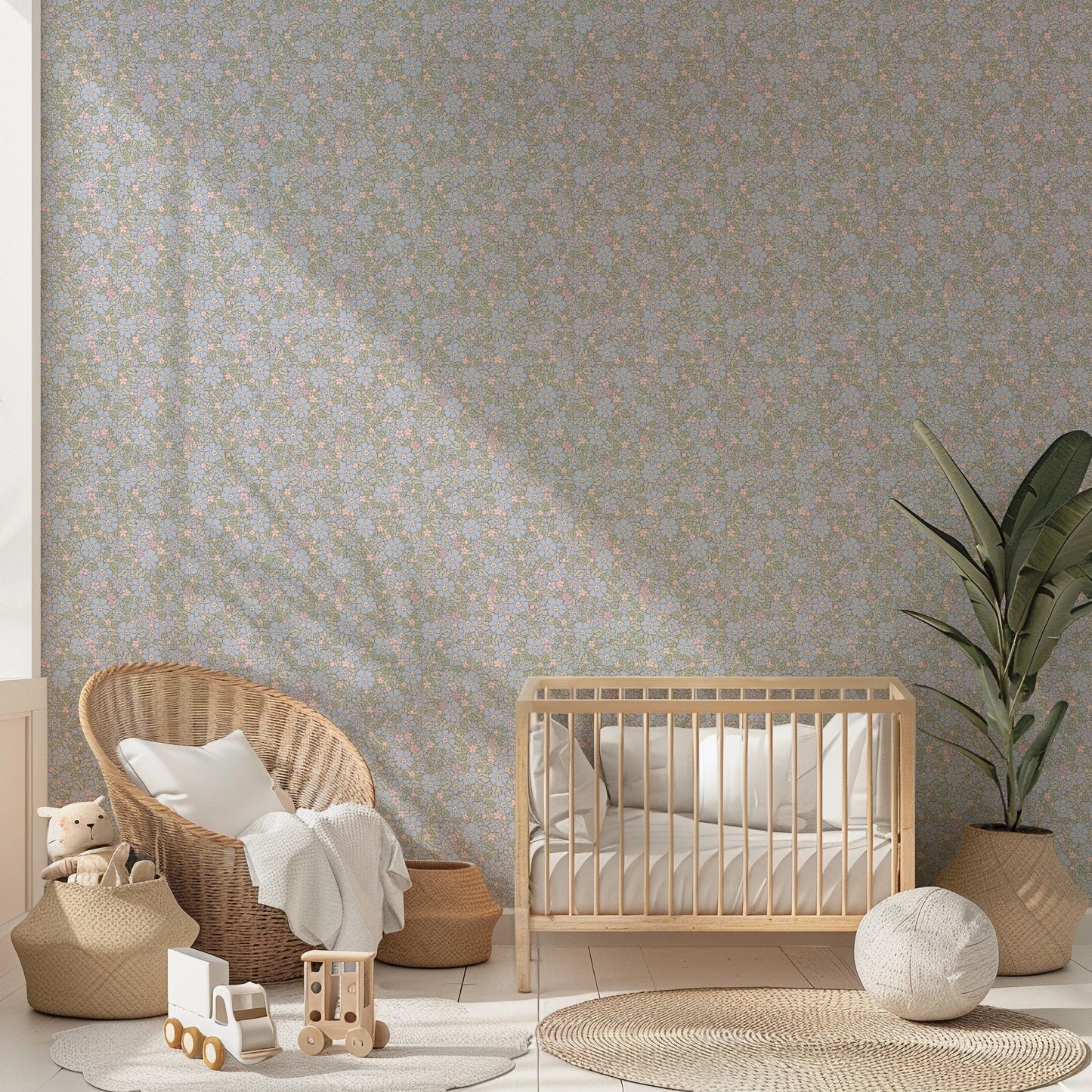 Cottage Meadow blue and pink floral wallpaper in a soft nursery