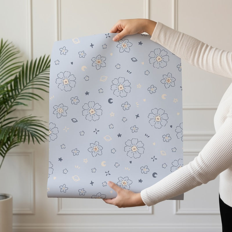 Starlit Meadow wallpaper roll drop showing the celestial floral line-art repeat