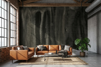 Nocturne Fold mural in a loft living room with exposed concrete and a sand-coloured sofa
