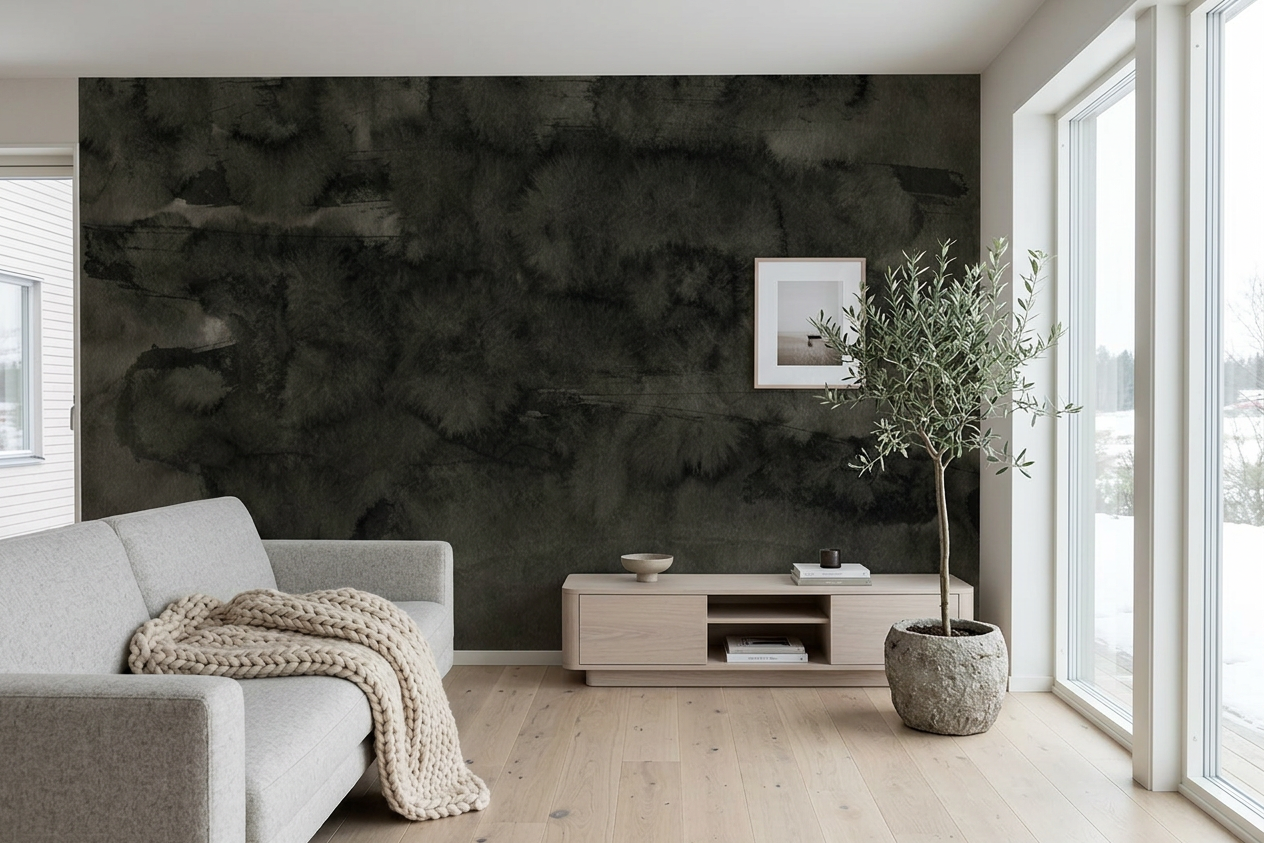 Nocturne Strata layered charcoal mural in a Scandinavian living room with a pale grey wool sofa