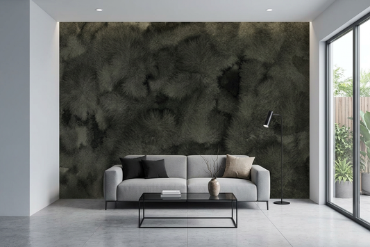 Nocturne Veil charcoal texture mural on a bedroom wall with an oatmeal upholstered headboard