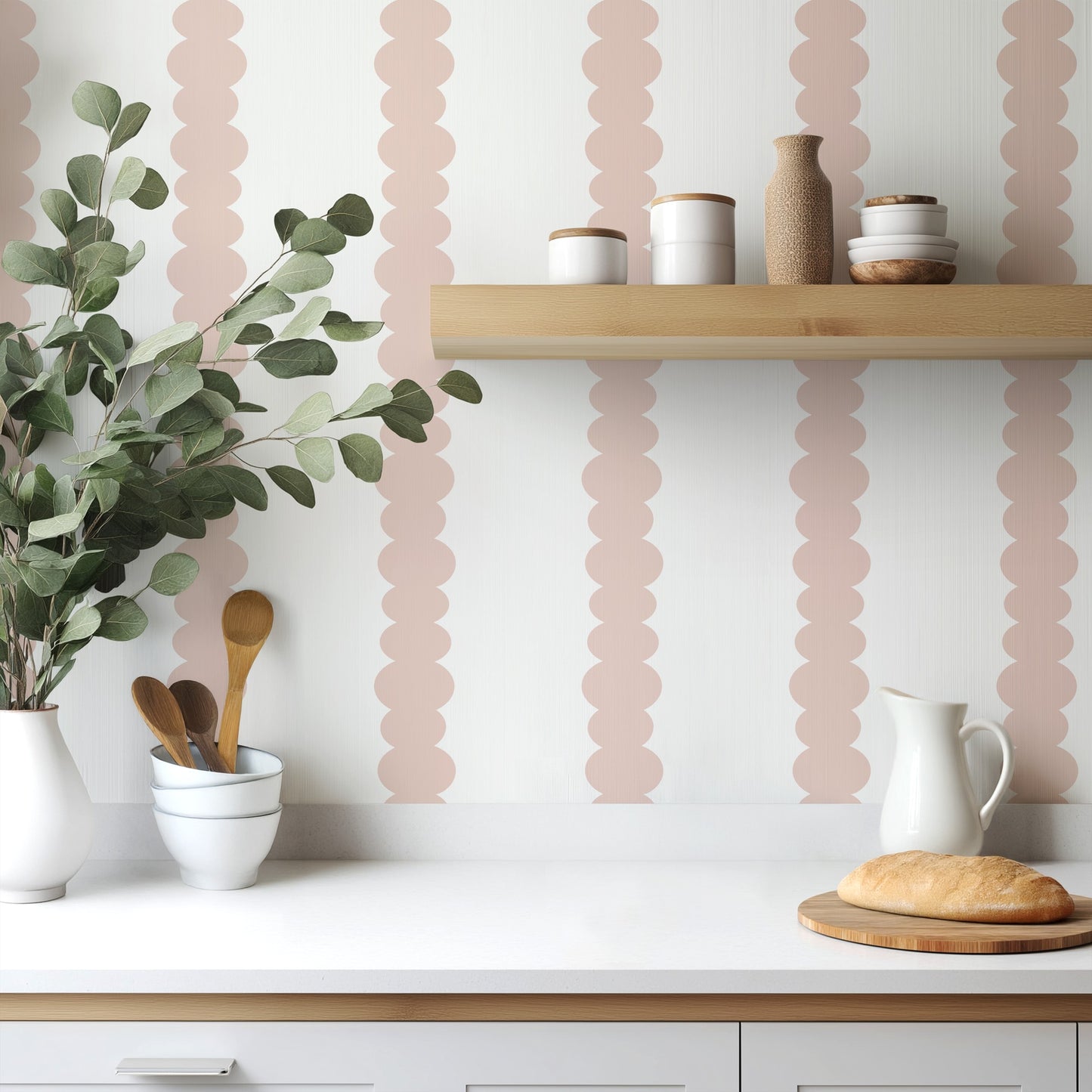 Scalloped Stripes Blush wallpaper in a bright kitchen with white cabinetry