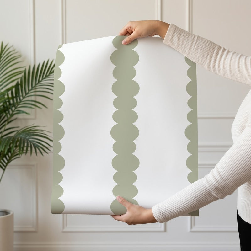 Scalloped Stripes Sage wallpaper roll drop showing the sage-green scalloped pinstripe repeat
