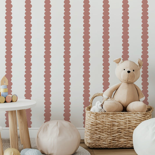 Scalloped Stripes Terracotta wallpaper in a playful children's playroom
