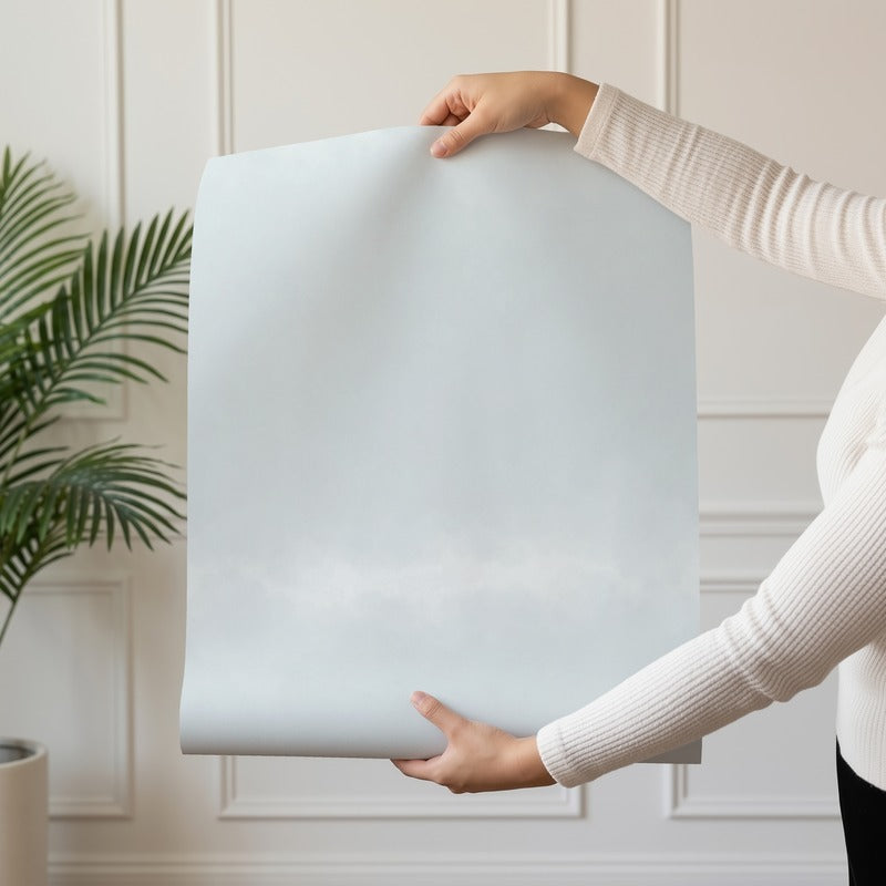 Sky Ombre wallpaper roll drop showing the soft blue-grey cloud gradient