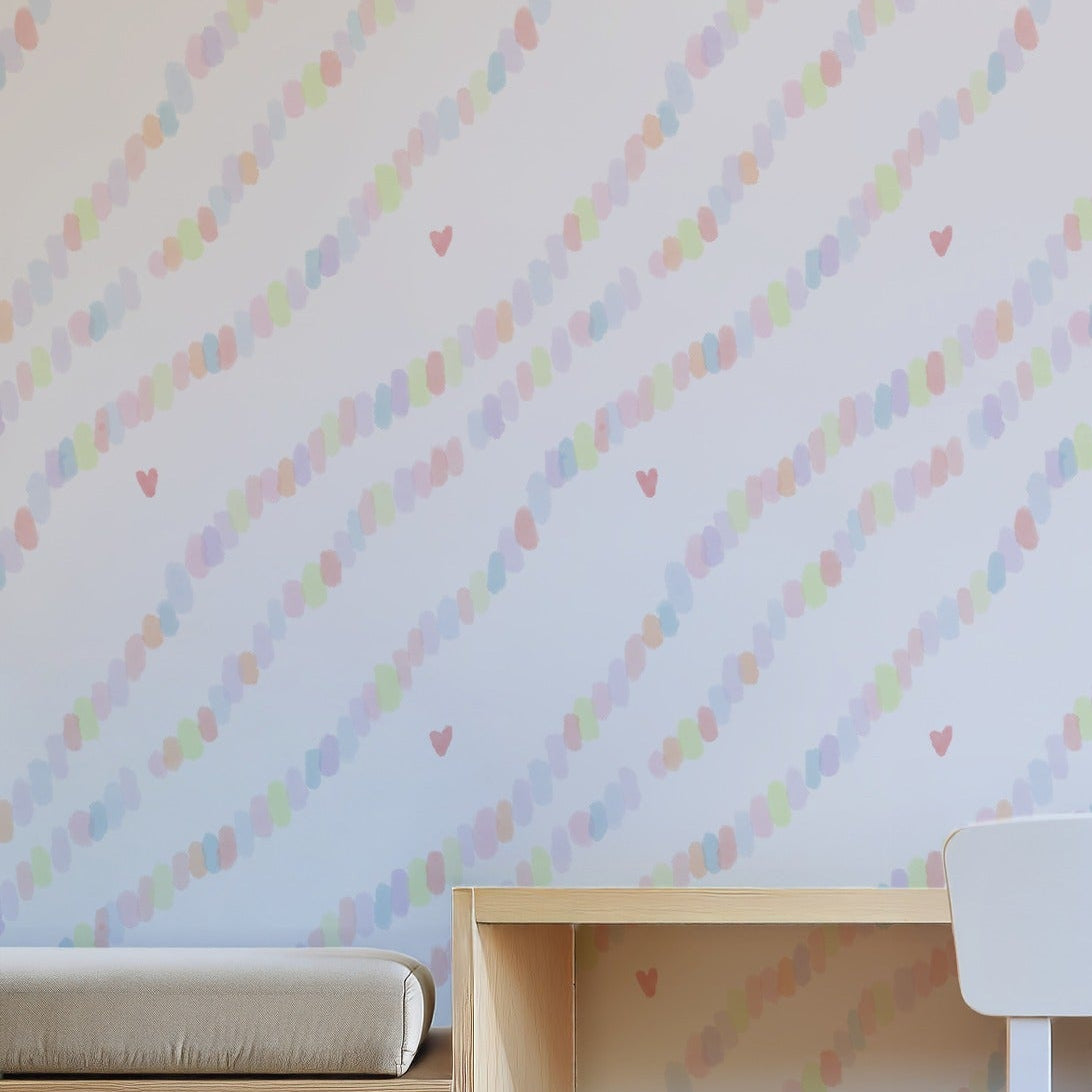 Sweetheart Confetti pastel wallpaper on a nursery wall