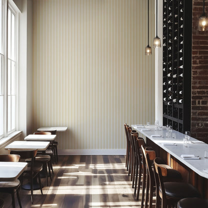 Buttercream & Warm Ivory – Thin Stripe Wallpaper styled in a boutique hotel and hospitality space