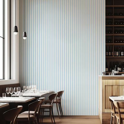 Thin Stripe Wallpaper – Powder Blue & Warm White styled in a boutique hotel and hospitality space