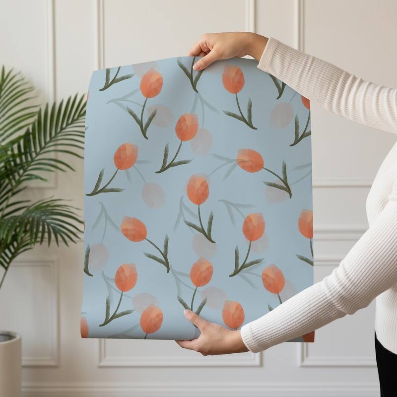Tulip Bloom wallpaper design — soft coral watercolour tulips on dusty blue