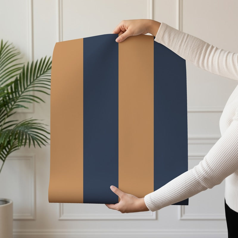 Wide Stripe Wallpaper roll in Caramel & Midnight Blue – graphic, wide stripes on a midnight blue ground
