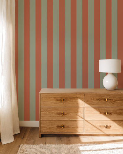 Wide Stripe Wallpaper – Sage & Baked Clay styled in a bedroom