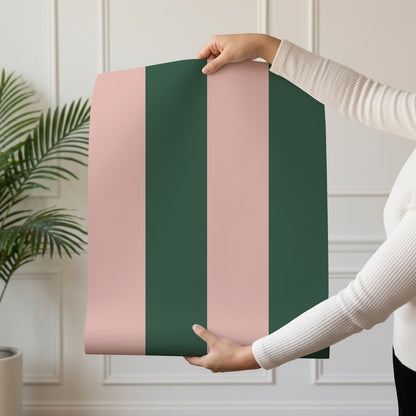 Wide Stripe Wallpaper roll in Warm Blush & Forest Green – graphic, wide stripes on a forest green ground
