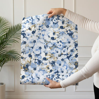 Winter Bloom wallpaper roll drop showing the dense blue and gold blooms repeat
